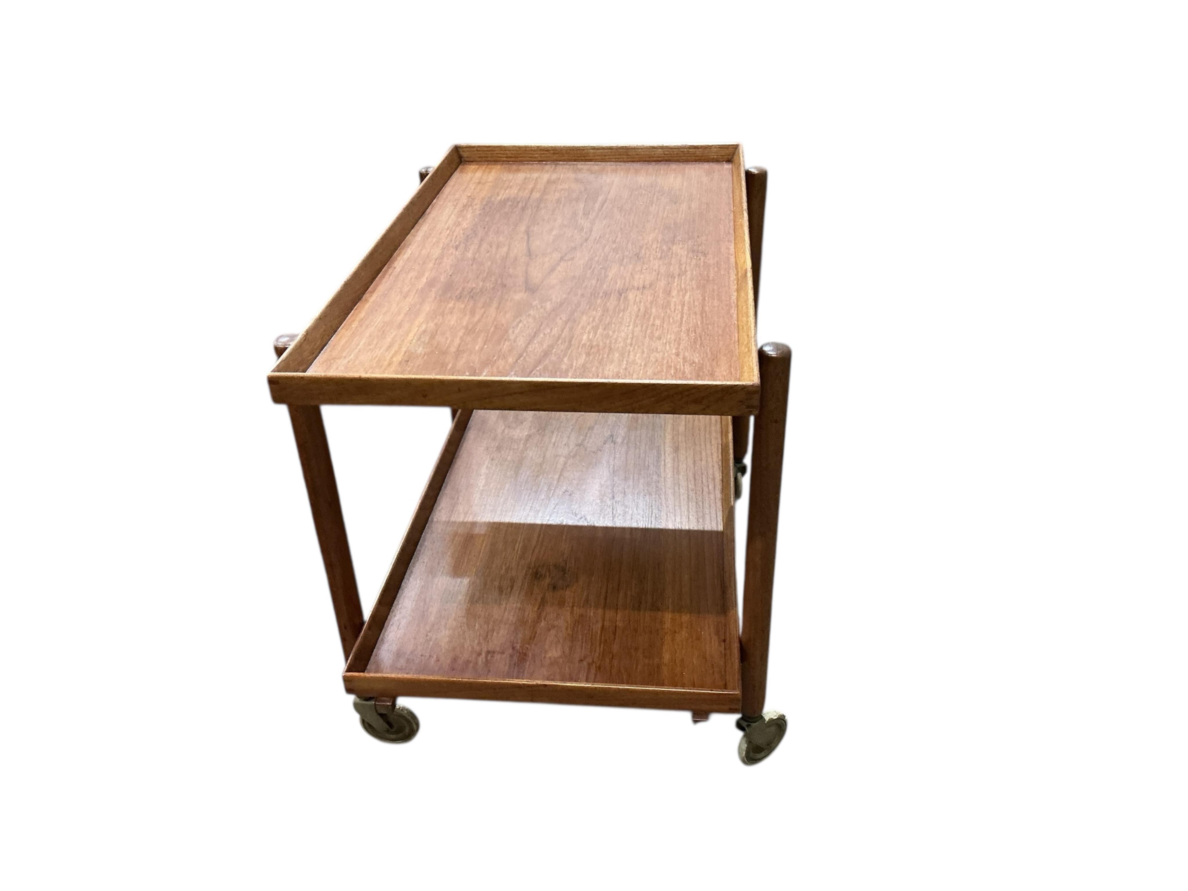 A Paul Hundevad mid century Danish rectangular teak two tier tea trolley, width 75cm, depth 50cm, height 60cm